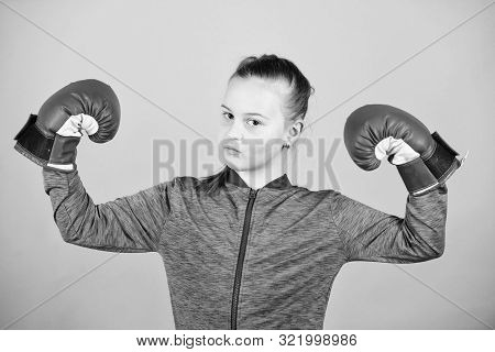 Female Boxer. Sport Upbringing. Boxing Provide Strict Discipline. Girl Cute Boxer On Blue Background