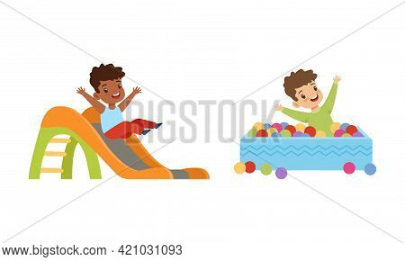 Kids Having Fun On Playground Set, Little Children Sliding Down Slide And Playing In Pool With Color