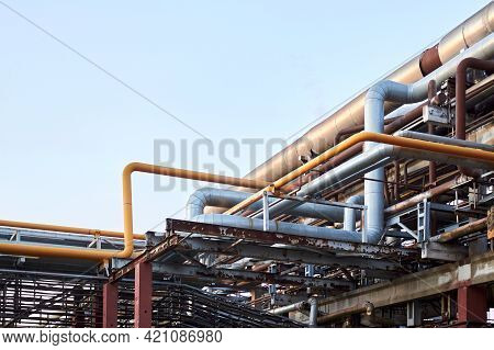 Pile Of Power Cabels And Steel Pipes With Gas, Oxigen Air Rust Covered With Traces Of Corrosion And 