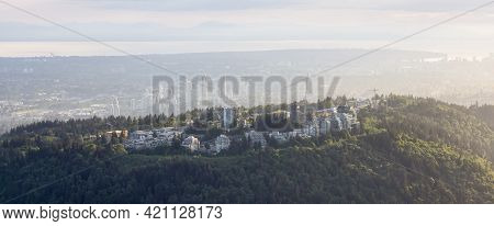 Aerial View Of Burnaby Mountain During A Vibrant Sunset. Taken In Greater Vancouver, British Columbi