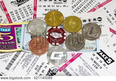 Babylon, New York, Usa - 17 May 2021: Bitcoin, Etherum, Litecoin Coins And Others On Top Of Lottery 