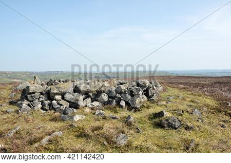 The Exposed Stones At The Top Of A Cairn Known As The Millers Grave On Midgley Moor In Calderdale We