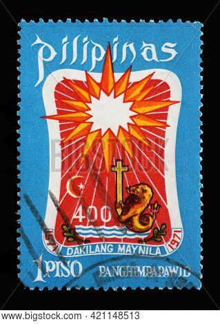 ZAGREB, CROATIA - SEPTEMBER 18, 2014: Stamp printed in Philippines shows Coat of arms Manila, Series The 400th Anniversary of Manila, circa 1971.