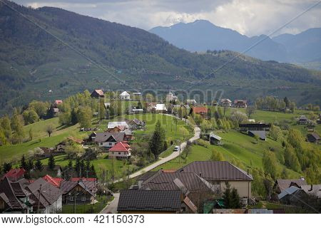 Pestera, Romania - May 14, 2021:rolling Hills With Villages And Forests In Transylvania, Romania, Wi