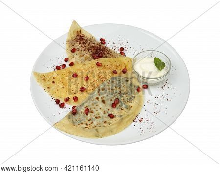 Kutaba Pastries With Different Fillings And Sauce On White Round Plate Isolated On White Background