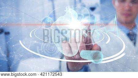 Composition of male doctor touching screen with heart and medical data processing. global medicine and healthcare concept digitally generated image.