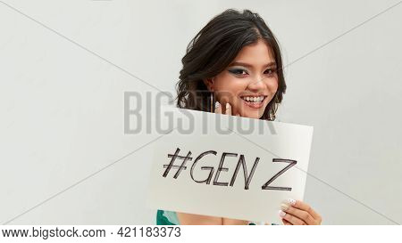 Pretty Young Excited Woman Holding #genz Text In Board