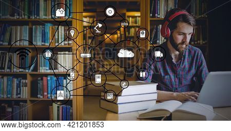 Black social network web against a man working in a library. library background concept. digitally generated image