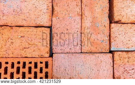 Red Bricks Stacked On Top Of Each Other Close-up