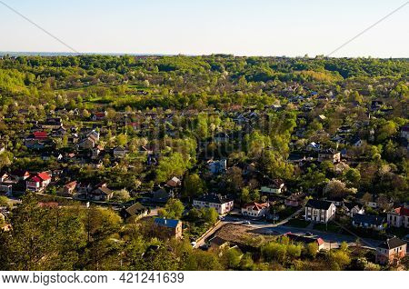 Awesome Panoramic Landscape View Of Kremenets Town During Sunset. Aerial View From The Bona Mountain