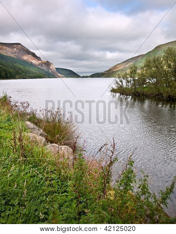 Landscape Over Llyn Cwellyn In Snowdonia National Park Towards Mountains In Distance