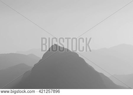 Monte San Salvatore As Abstract Layered Landscape Seen Through Fog.