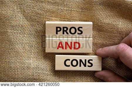 Pros And Cons Symbol. Wooden Blocks With Words 'pros And Cons'. Beautiful Canvas Background, Busines
