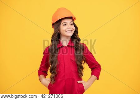 Happy Teenager Girl In Safety Hard Hat, Builder