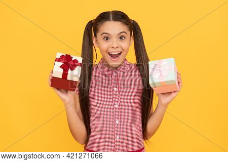 Taking Two. Child Share Gifts. Surprised Kid After Successful Shopping. Sales And Discounts.