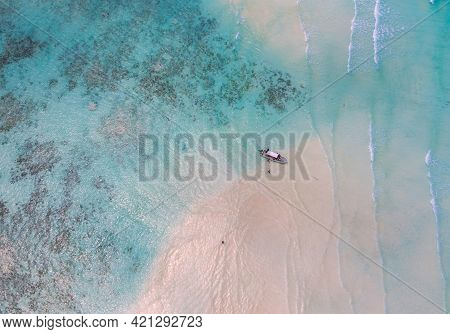 Aerial Shot Of The Mnemba Island White Sand Sandbanks Washed With Turquoise Indian Ocean Waves Near 