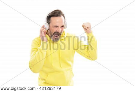 Cheerful Mature Man In Hoody Listen Music Or Audio Book In Headphones Isolated On White, Music.