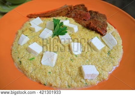 Peruvian Popular Quinoa Stew Called Quinua Atamalada With Roasted Beef