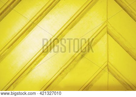 Yellow Wooden Wall Gives A Harmonic Pattern