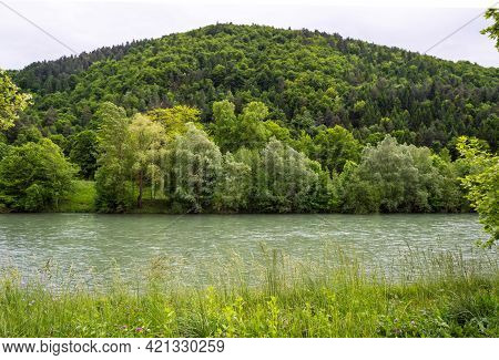 Scenic Landscape Of Hills. View Of He Savinja River With Rural Surroundings In Celje. Celje Is The T