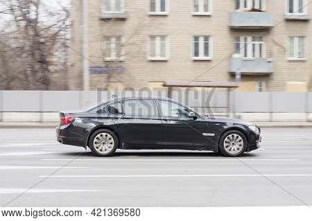Moscow, Russia - March 2021: Bmw 7 Series F01 On The Road In Motion. Fast Speed Drive On City Road