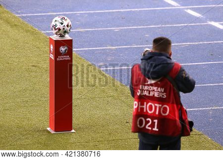 Kyiv, Ukraine - March 28, 2021: Photographer Takes A Picture Of The Official Match Ball Of The Fifa 