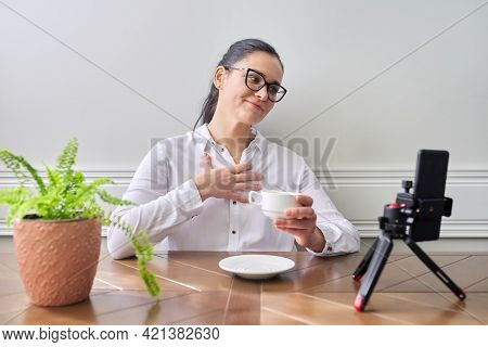 Young Woman Blogger Vlogger Recording Broadcast At Home