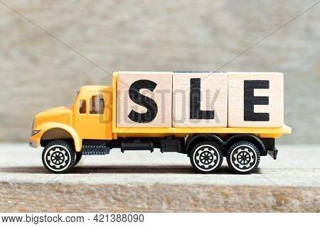 Toy Truck Hold Alphabet Letter Block In Word Sle (abbreviation Of Systemic Lupus Erythematosus) On W