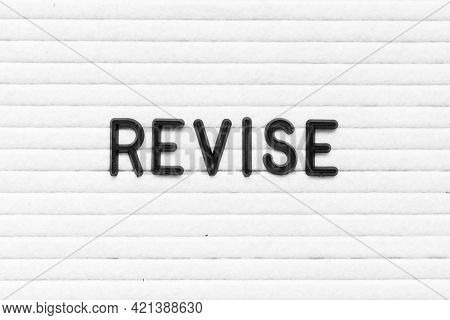 Black Color Letter In Word Revise On White Felt Board Background
