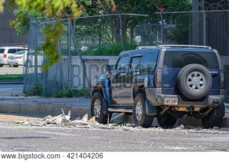 New Orleans, La - May 22: Parked Car And Fallen Debris From Abandoned Plaza Tower Building In Centra