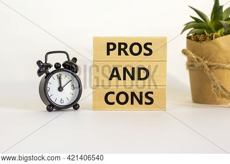 Pros And Cons Symbol. Wooden Blocks With Words 'pros And Cons'. Beautiful White Background, Black Al