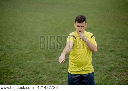 Referee Showing On Penalty While Gaming. Concept Of Sport, Rules Violation, Controversial Issues, Ob