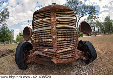 Close Up Of The Front Grill Of An Old Rusted Truck In The Country, Fish Eye Lens
