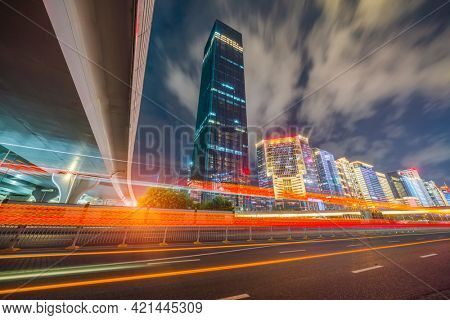 modern buildings in china shenzhen futian from elevated walkway at night