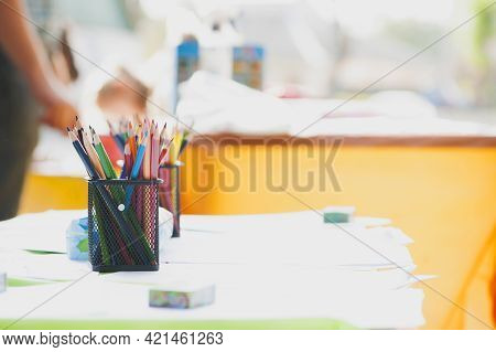 Multicolored Pencils In The Office. Drawer For Pens And Pencils. Colored Pencils In A Pencil Case. C