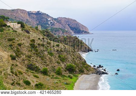 Tower On Spanish Coast, Seaside Cliffs Of Maro Cerro Gordo. Costa Del Sol, Andalusia Spain.