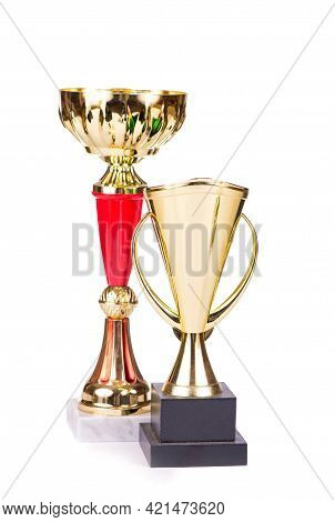 Trophies, Cups Isolated On White. The Trophy Is A Tangible And Lasting Reminder Of A Specific Achiev