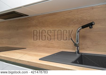 Interior Of A Modern Kitchen With A Faucet And Sink, Minimalism