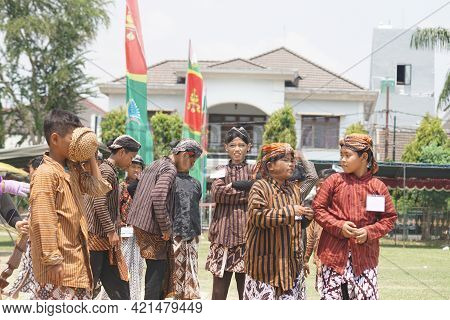 YOGYAKARTA, INDONESIA - OCTOBER 27, 2019; The participants of an archery event or jeparingan in one 