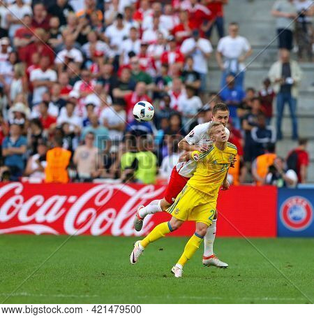 Marseille, France - June 21, 2016: Olexandr Zinchenko Of Ukraine (in Yellow) Fights For A Ball With 