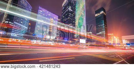modern buildings in china shenzhen futian from elevated walkway at night