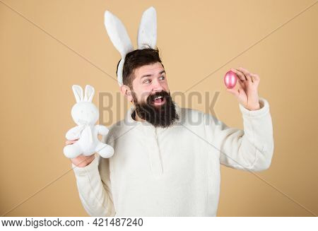 Easter Activities Concept. Weirdo Concept. Celebrate Easter. Guy Bearded Hipster Weird Bunny With Lo