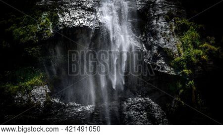 Stream Of Fresh Water Pouring Down Through The Rocks In A Tropical Forest, Natural Beauty Of The Mot