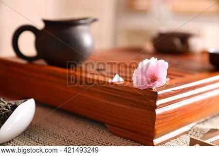 Tray For Traditional Tea Ceremony With Sakura Flower On Table, Closeup