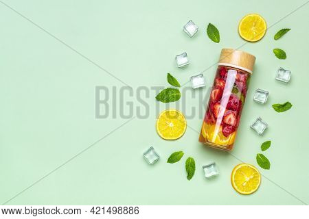 Strawberry Infused Water, Cocktail, Lemonade Or Tea. Summer Iced Cold Drink With Strawberry, Lemon A