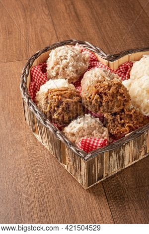 Cocada, Coconut Candy From Brazil, White And Brown Heart-shaped Wooden Cocadas, Selective Focus.