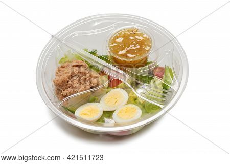 Fresh Tuna Salad With Lettuce, Cucombers, Cherries And Eggs In Plastic Container.  Top View.