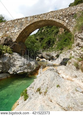 Stone Bridge In The Nervia Valley Near The Rio Barbaira Stream, Rocchetta Nervina, Liguria - Italy