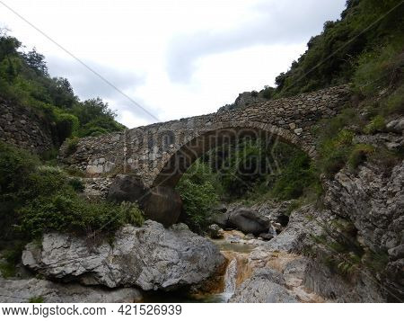 Stone Bridge In The Nervia Valley View Near The Rio Barbaira Stream, Rocchetta Nervina, Liguria - It