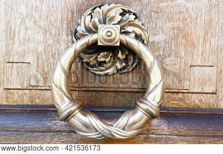 European Vintage Old Metal Wrought Iron Door Knocker. Design Detail. Paris.